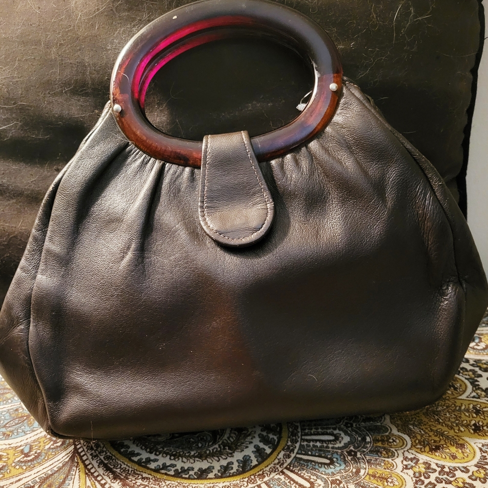 Chic Black Leather Clutch with Unique Handle